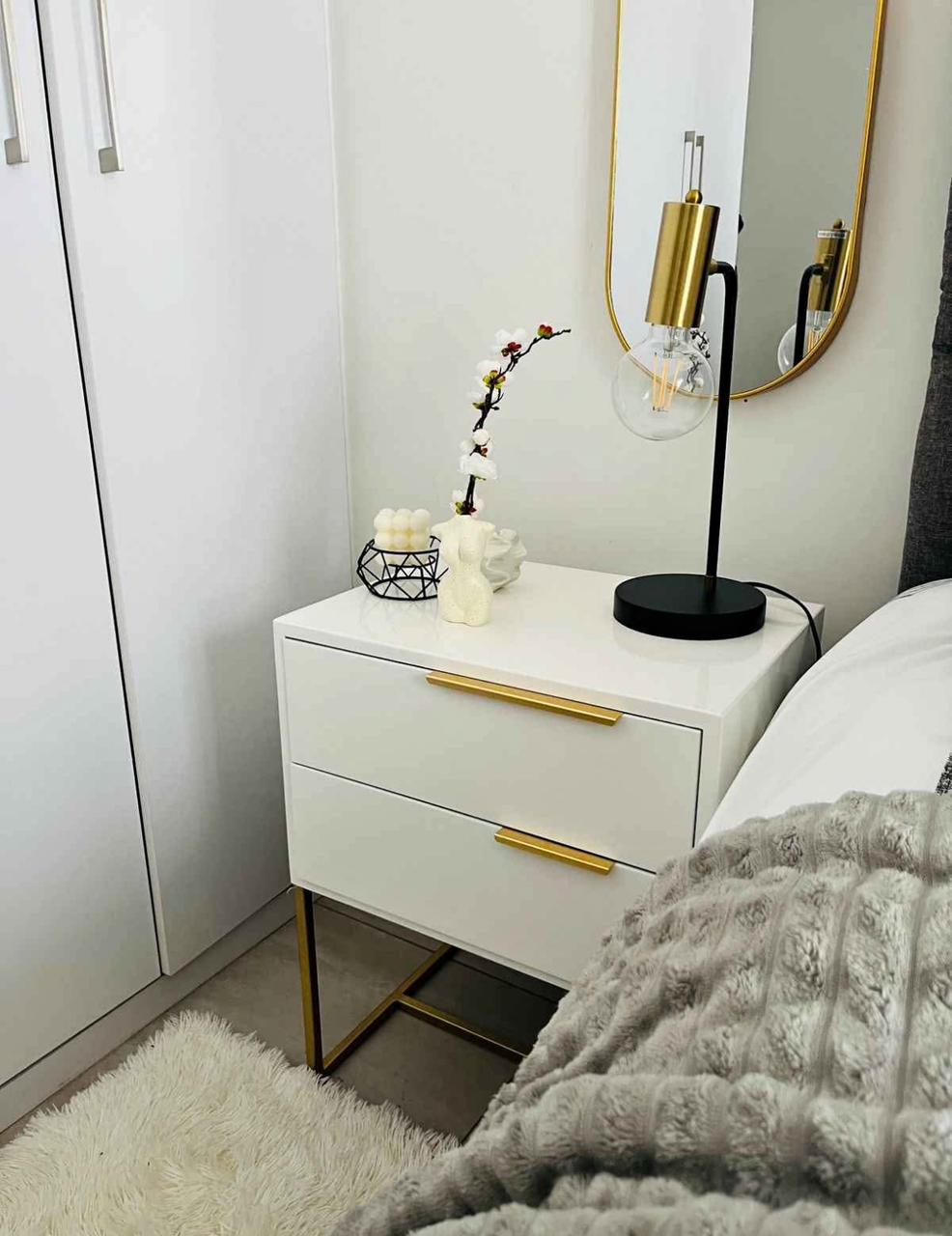 Wooden nightstand with golden handles